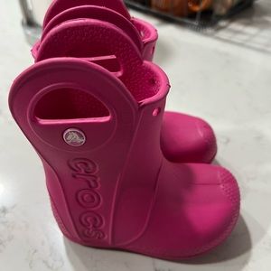 Pink croc rain boots